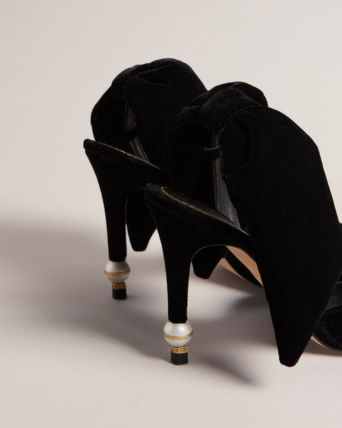 BATALYN-Shoes-Indulge in timeless glamour with our BATALYN heels. The unique design boasts a golden band and faux pearl detail on the heel, exuding luxury and sophistication that will elevate any outfit to statement status. Court heels Large bow on heel Golden band and pearl heel detail Pointed toe Slingback heel Heel height: 10.3cm- Ted Baker Romania